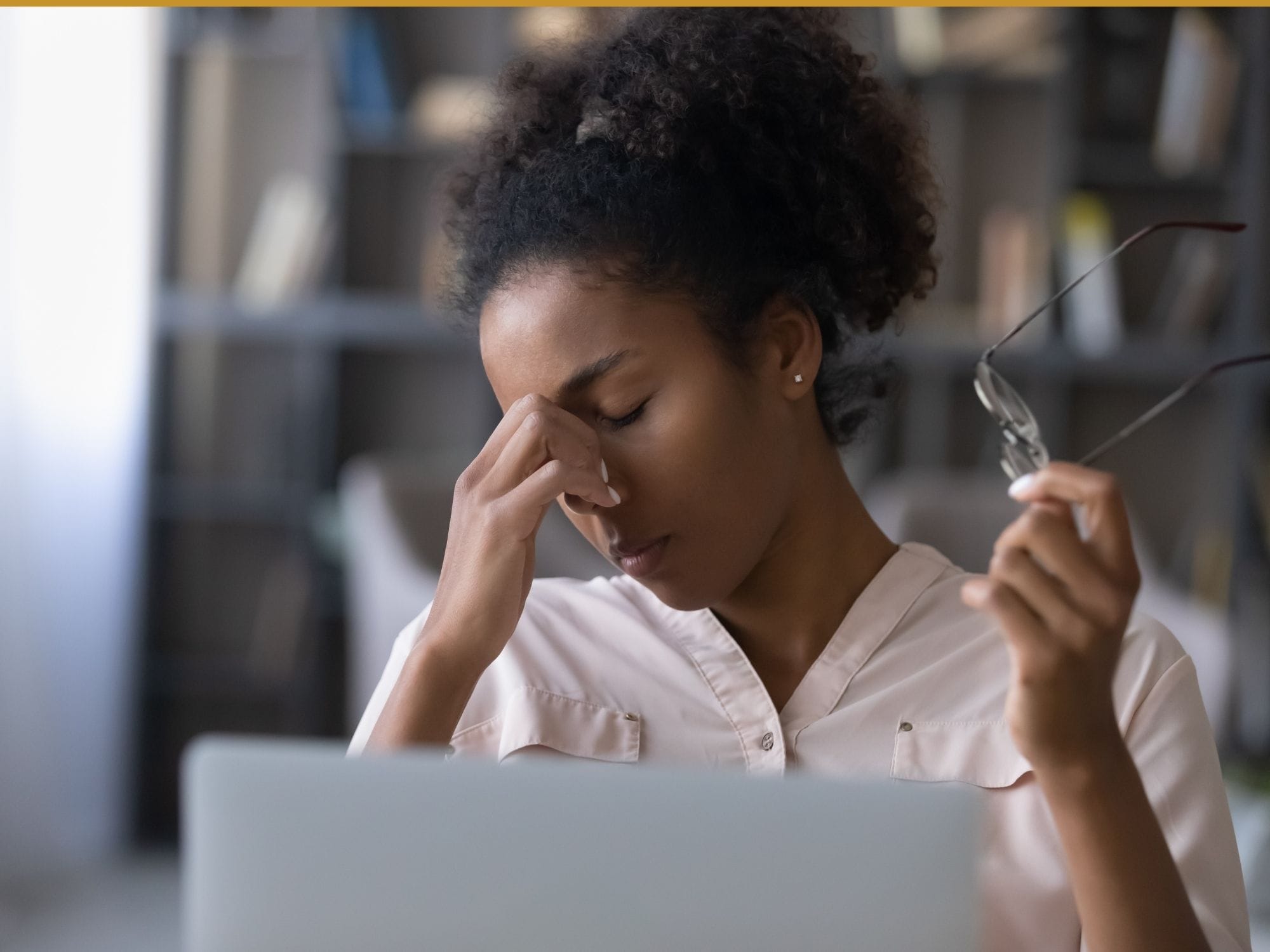 Exhausted millennial african woman suffering from dry eyes syndrome. by fizkes from Getty Images